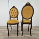 Pair of early 1900s wooden chairs with padded seat and backrests