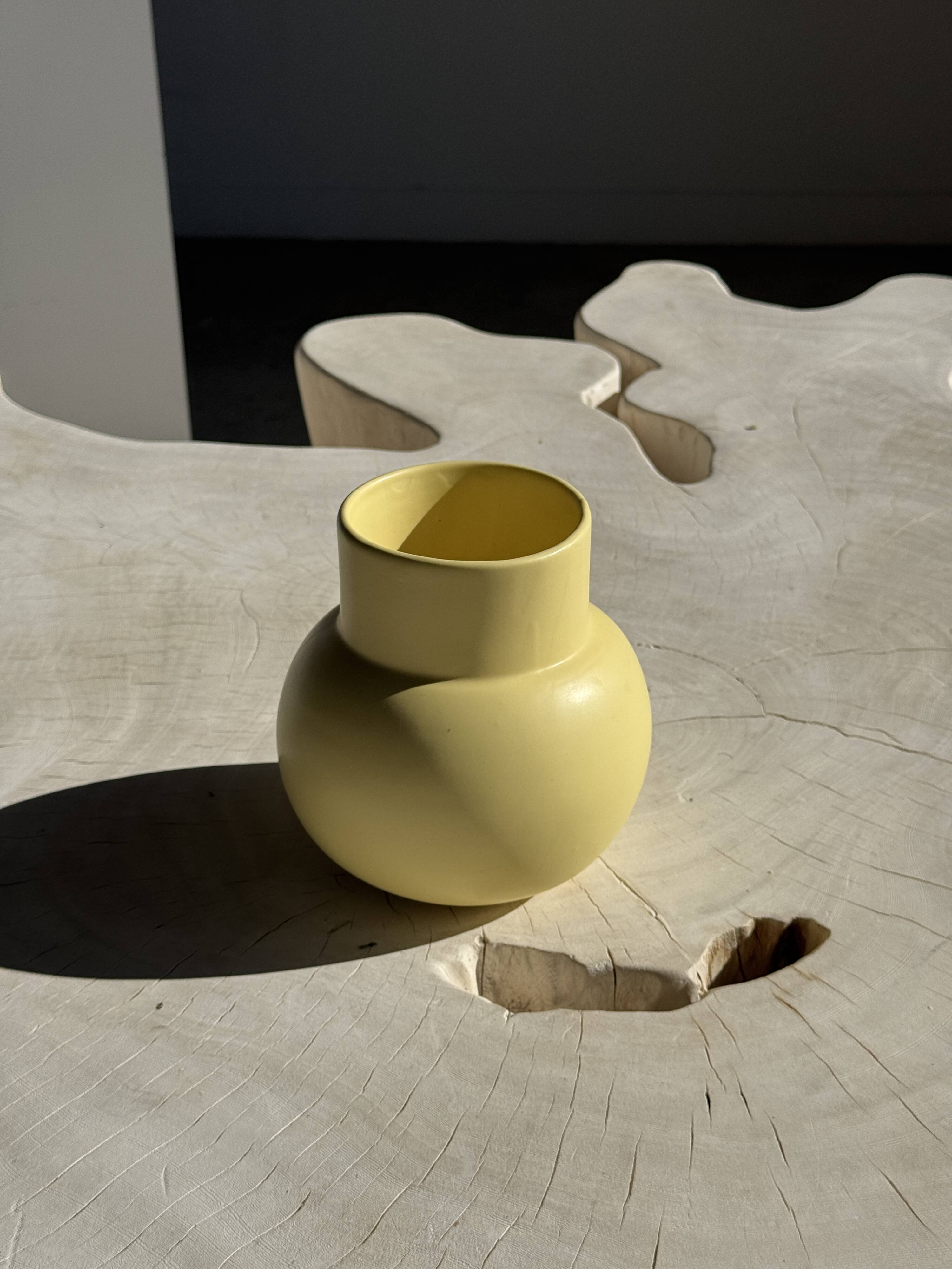 Small light yellow ball vase