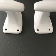 Pair of retro white porcelain hooks