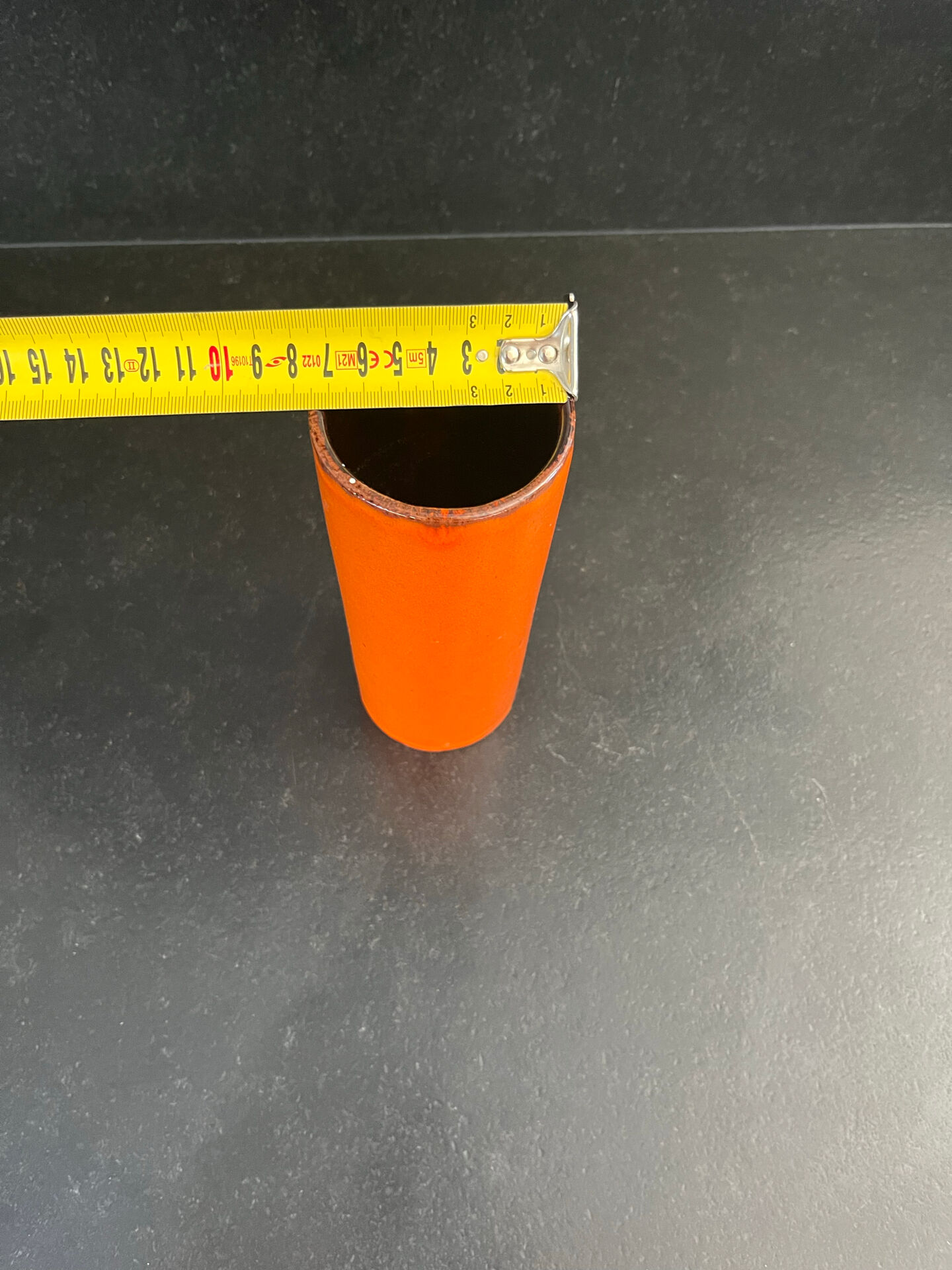 Orange glazed ceramic cylinder vase
