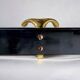 Vintage coat rack in lacquered metal with three golden aluminum hooks