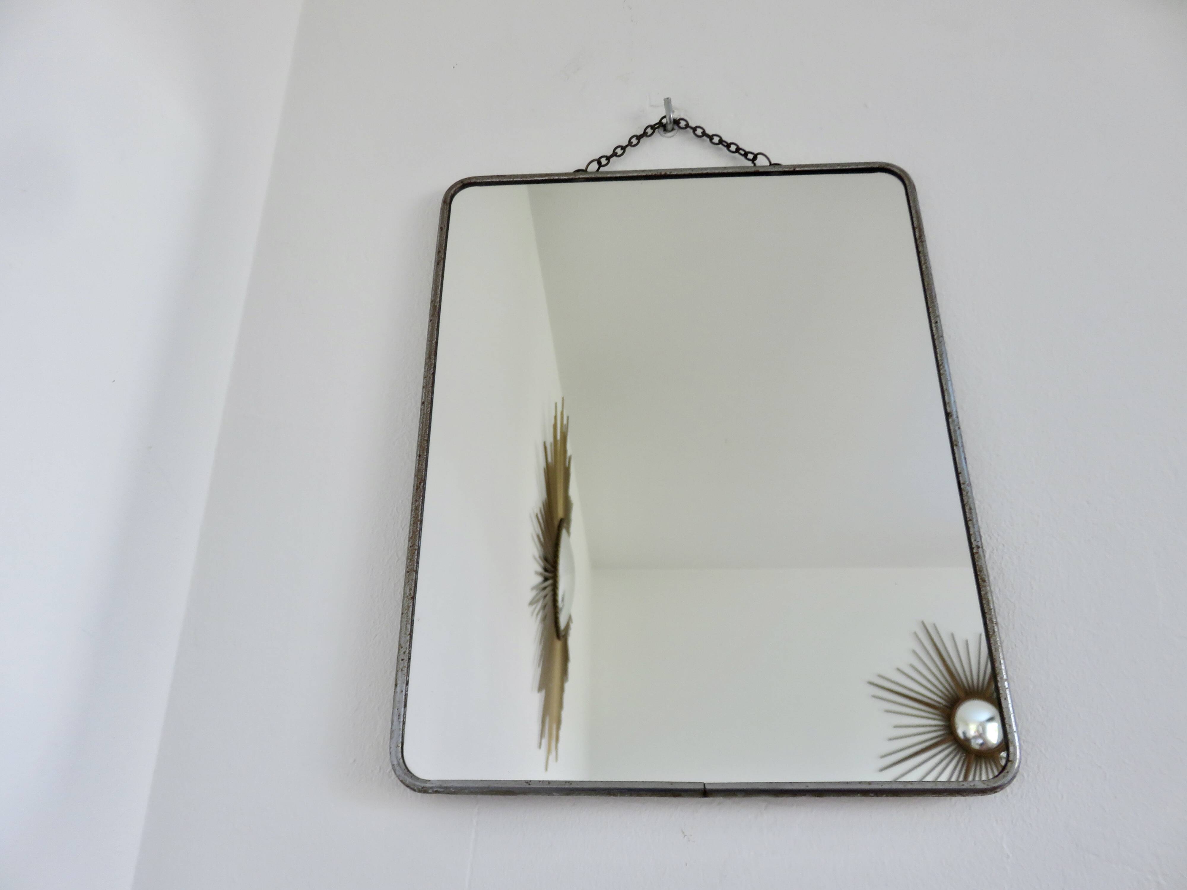 Old barber's mirror with chain, 1950s and 1960s