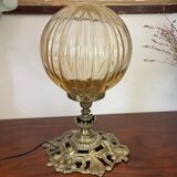 Bronze lamp and amber globe circa 1900