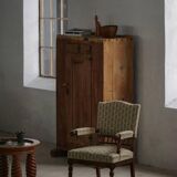 Fauteuil danois moderne en bois tourné avec tissu floral, début du XXe siècle