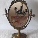 Psyche on foot brass mirror 28x39cm