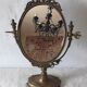 Psyche on foot brass mirror 28x39cm