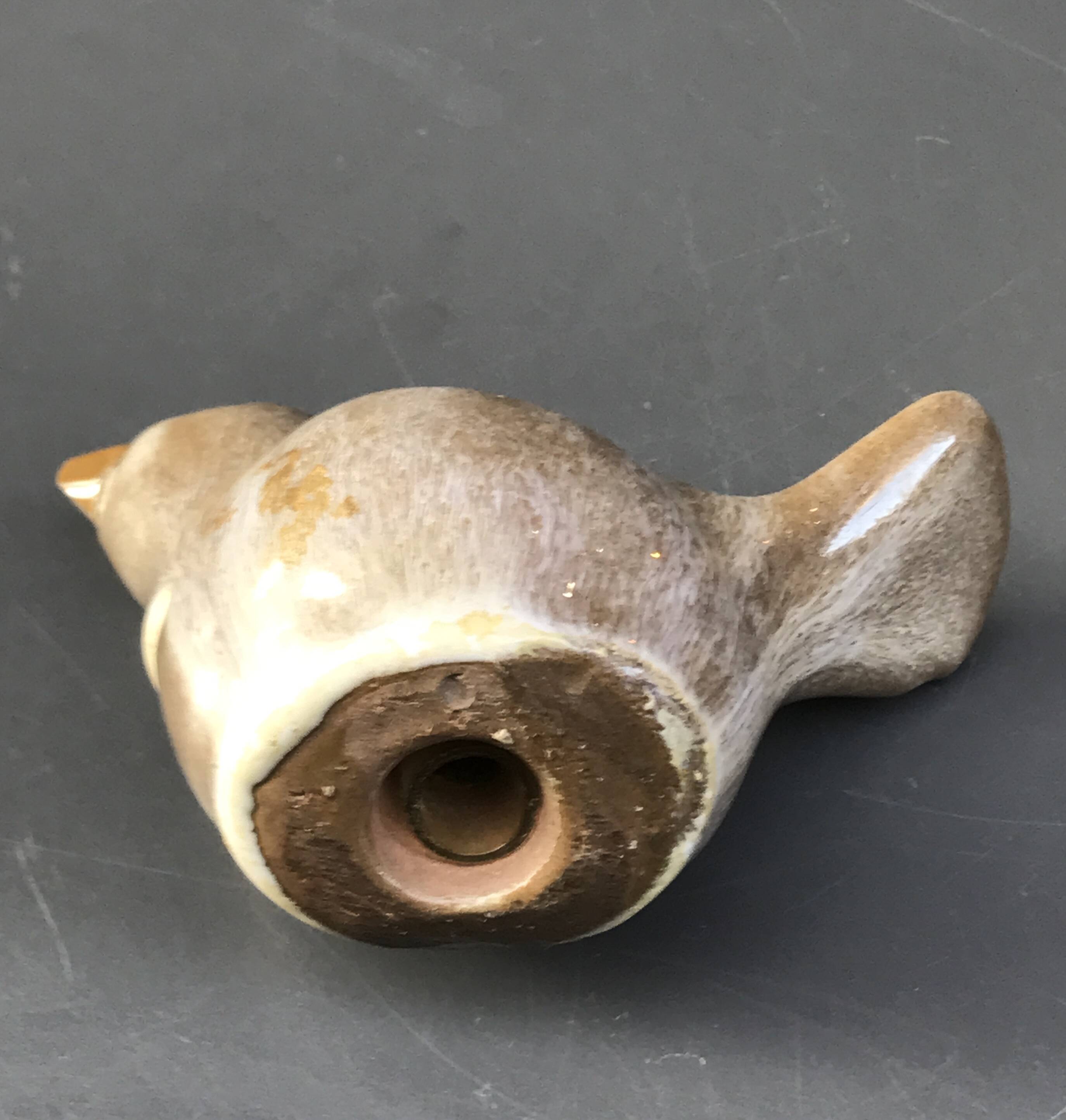 Beige ceramic bird