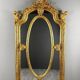 Large Louis XV style mirror in carved and gilded wood, 19th century