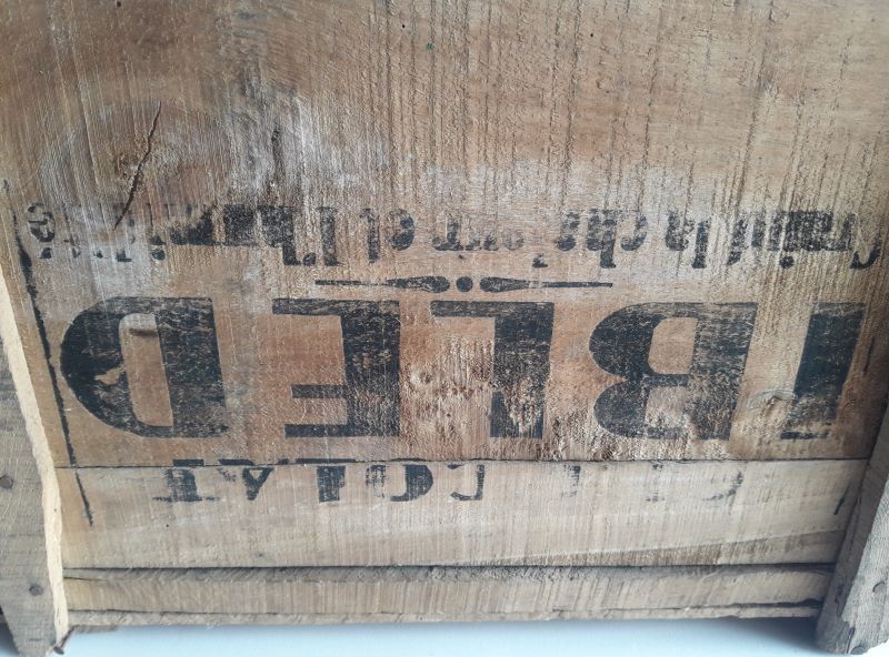 Ibled chocolate box in old wooden transport