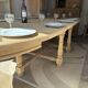 Solid oak farmhouse table with extensions.