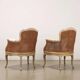 Pair of antique Rococo-style armchairs in painted wood, 20th century.