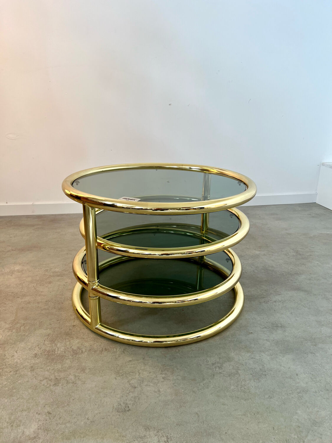 Three-level swivel coffee table in morex design brass Milo Baughman italy