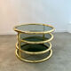 Three-level swivel coffee table in morex design brass Milo Baughman italy