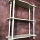 Old painted wooden shelf to hang