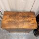 Antique English commode in flame walnut.