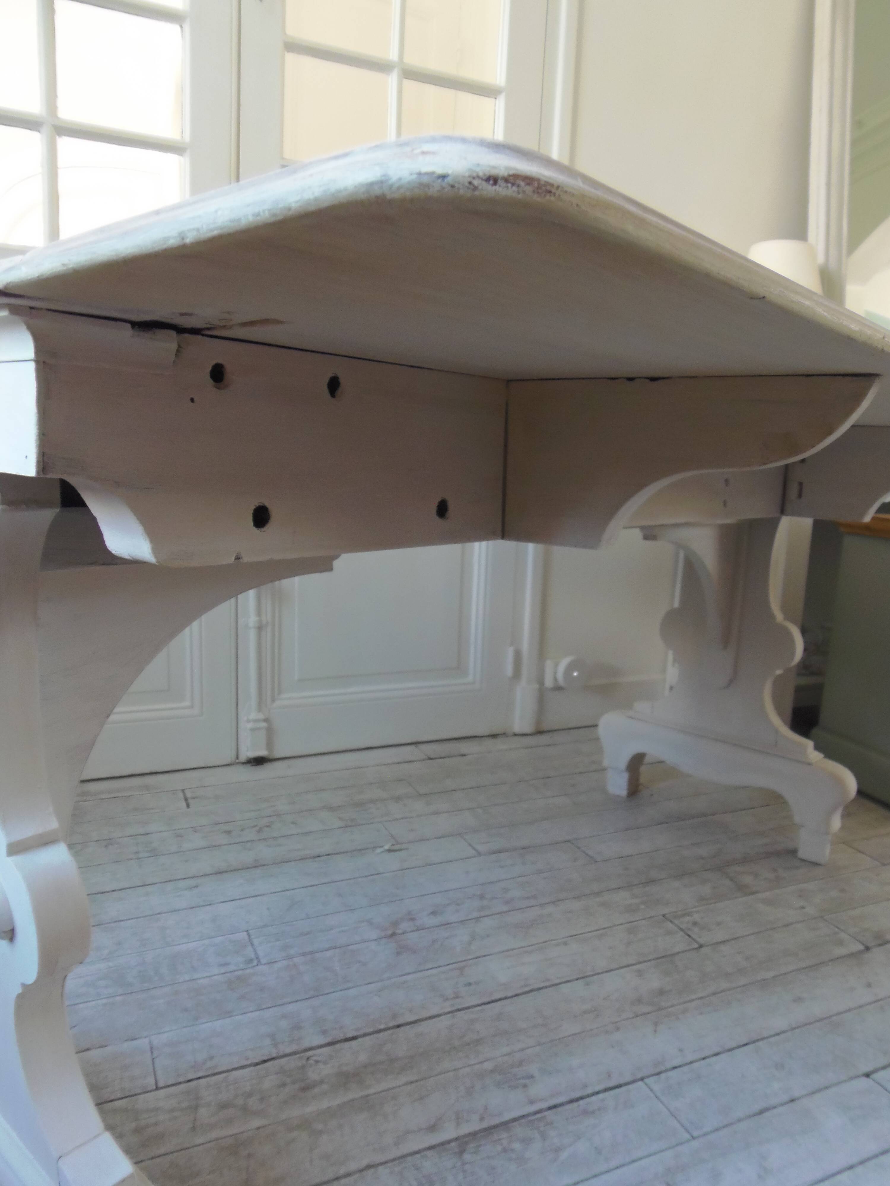 Console, solid walnut table, foldable extensions, grey patinated legs.