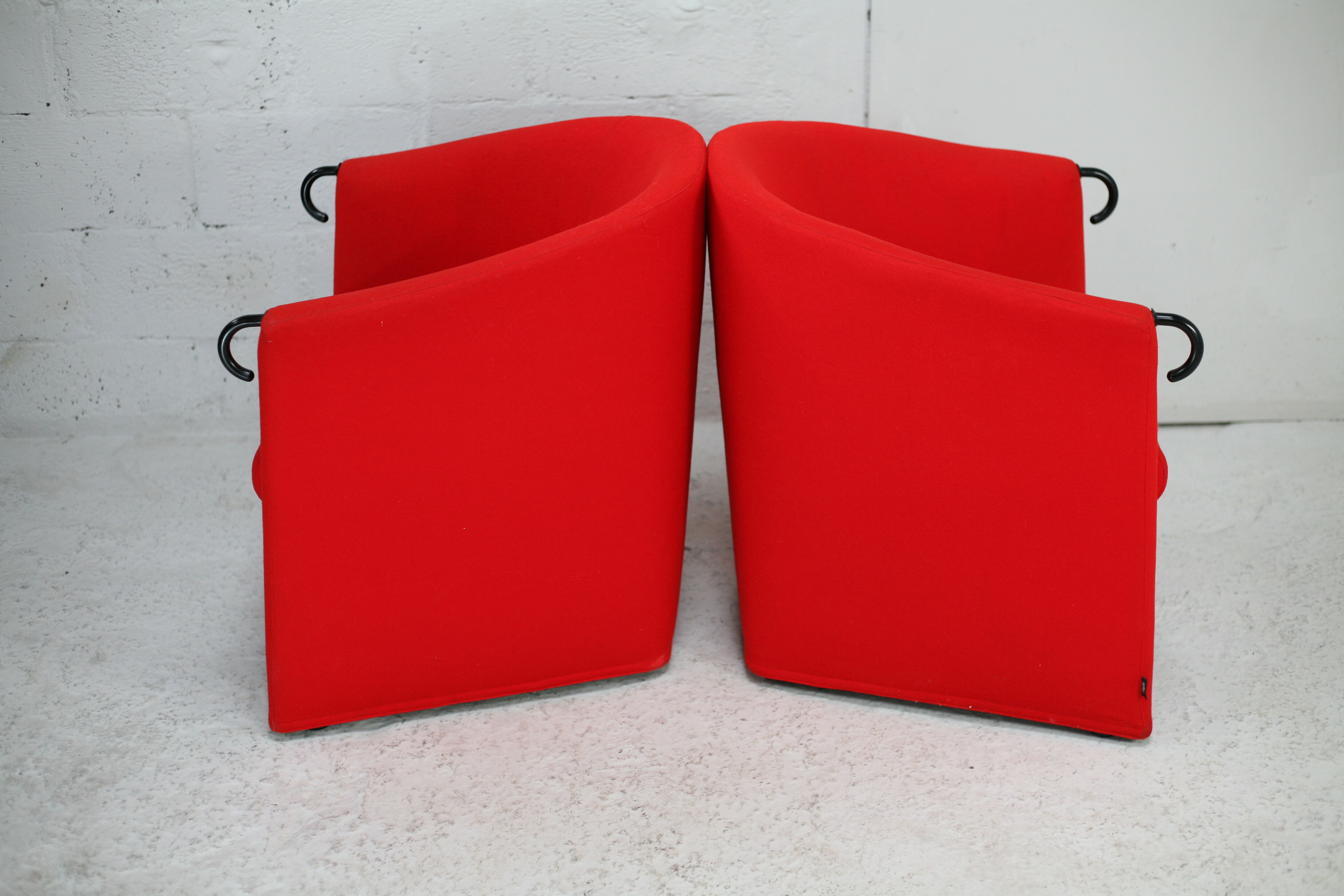Pair of red Arflex armchairs. Italy, circa 1980