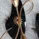 Vintage 1950s wall lights, black metal with gilded brass, 50s retro.