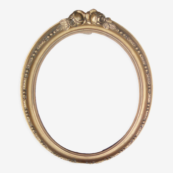 Oval photo frames in gilded wood with decoration, late 19th century