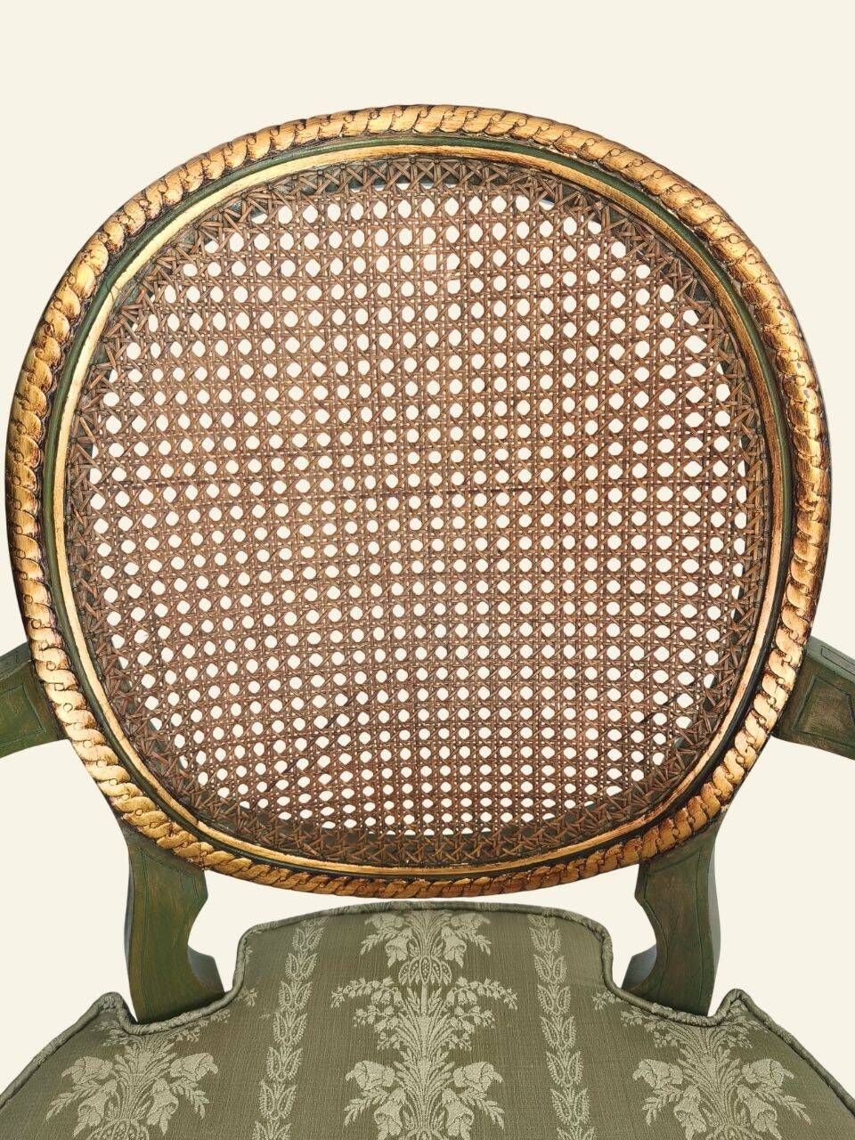 Pair of Louis XVI style armchairs, oval backrest and caning.