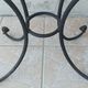 Bistro table in wrought iron and walnut