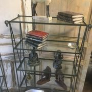 Pair of wrought iron and glass bookshelf shelves.