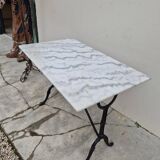 Antique marble and cast iron bistro restaurant table