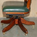 Modern captain's chair in leather, beech frame, adjustable.