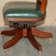 Modern captain's chair in leather, beech frame, adjustable.