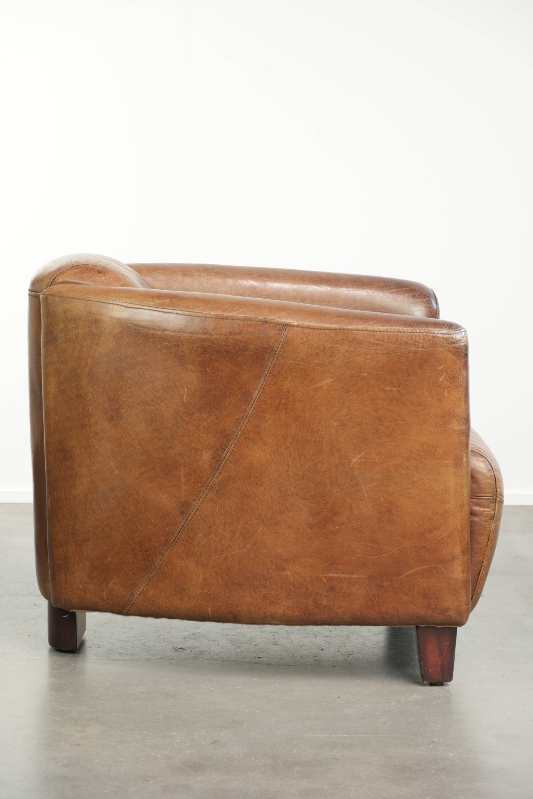 Fauteuil design aviateur en cuir de vache couleur cognac intemporelle
