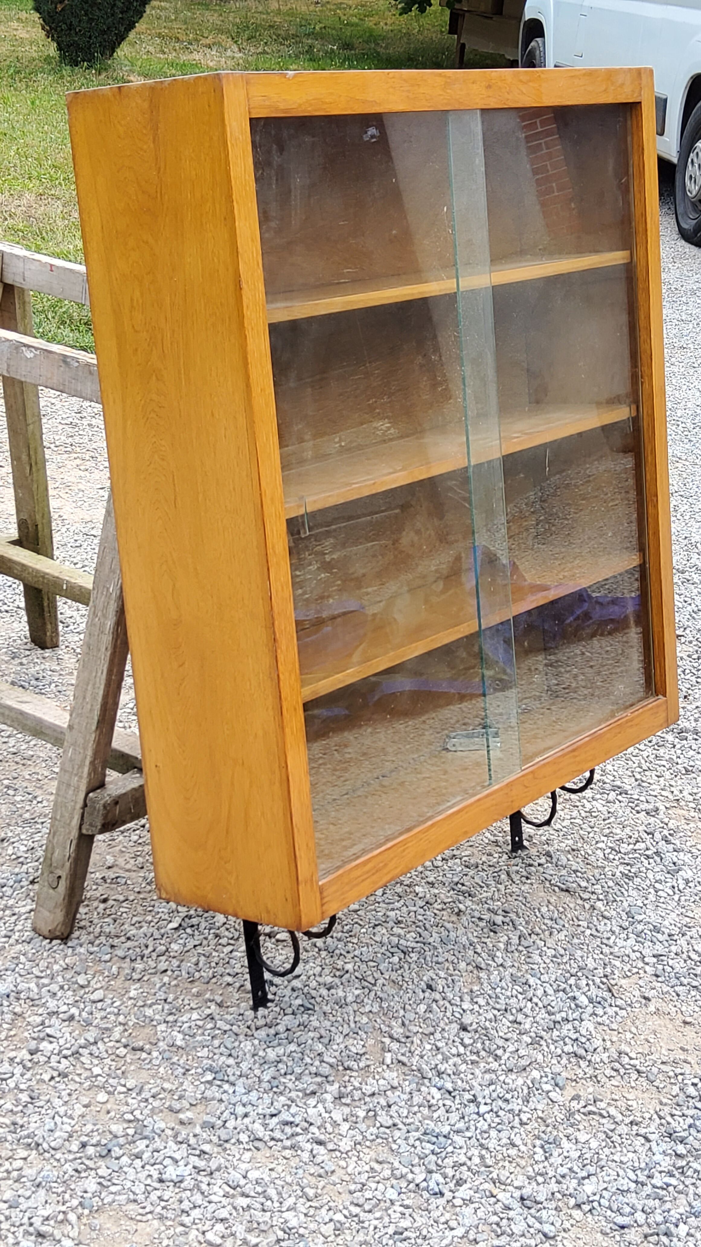 Wall display case from the 50s in solid blond oak