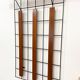 Metal and wood wall coat rack, 1950s-60s.