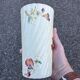 Antique twisted earthenware vase circa 1920, decorated with flowers