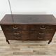 Chest of drawers with five drawers in wood and brass