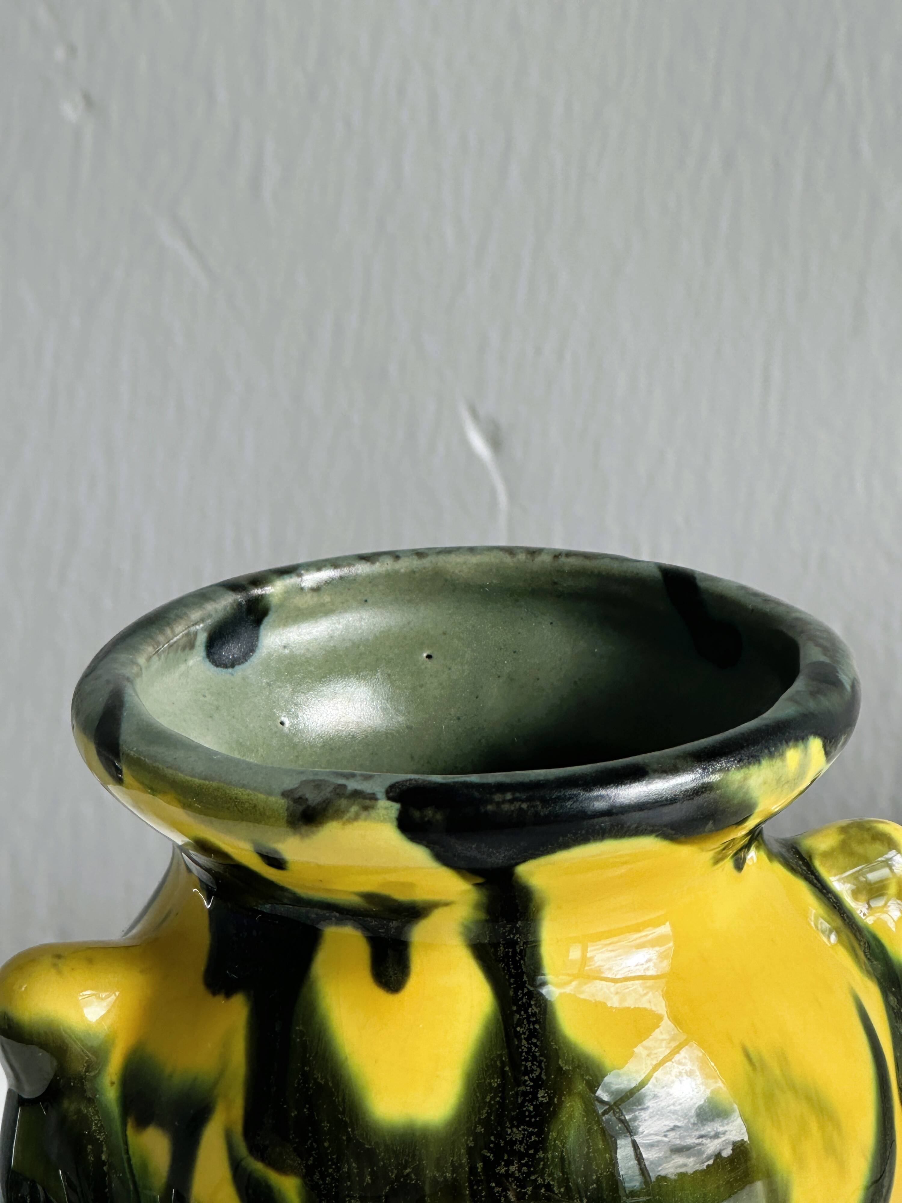 Small yellow and green ceramic vase