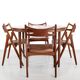 Set of 4 oak Hans Wegner Sawbuck model CH29 chairs by Carl Hansen and Son