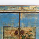 Old wooden entrance buffet in blue and yellow tones (circa 1920).
