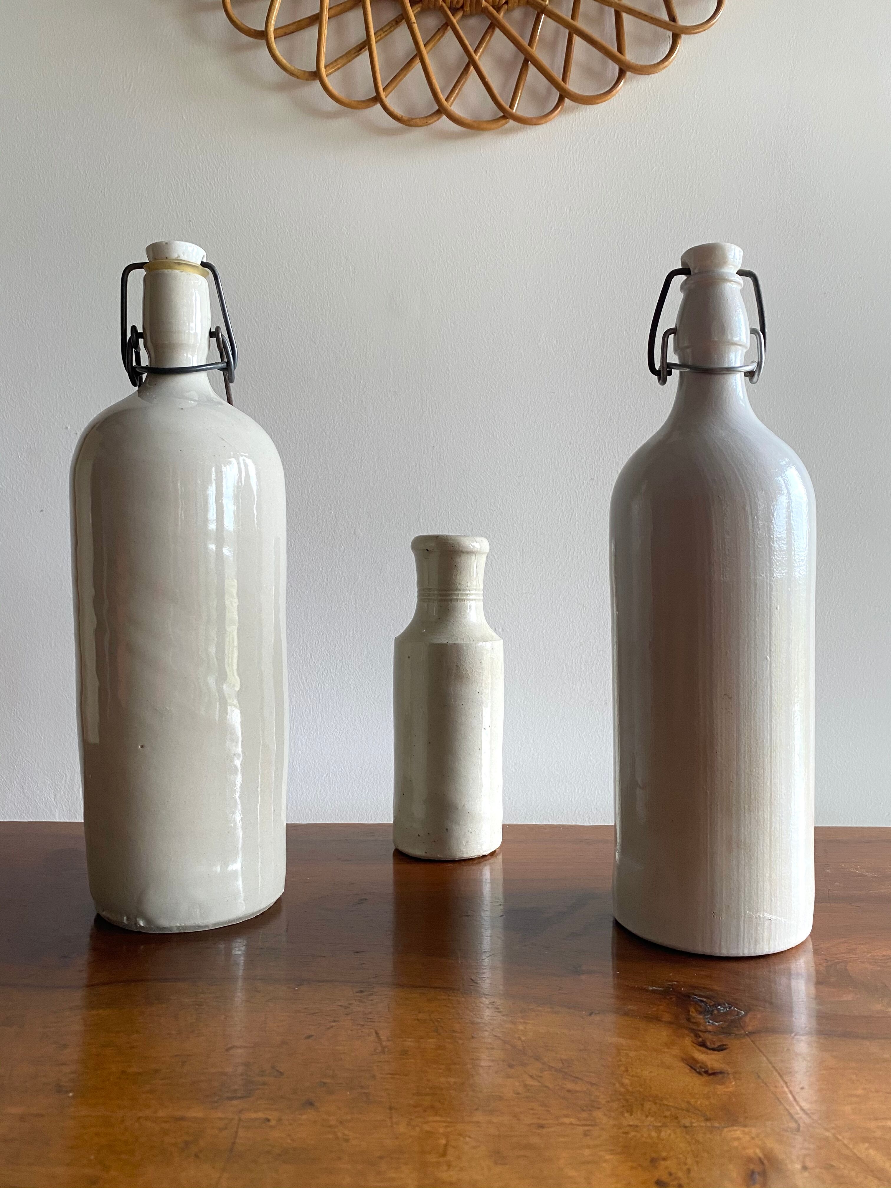 Set of 2 old bottles in glazed stoneware