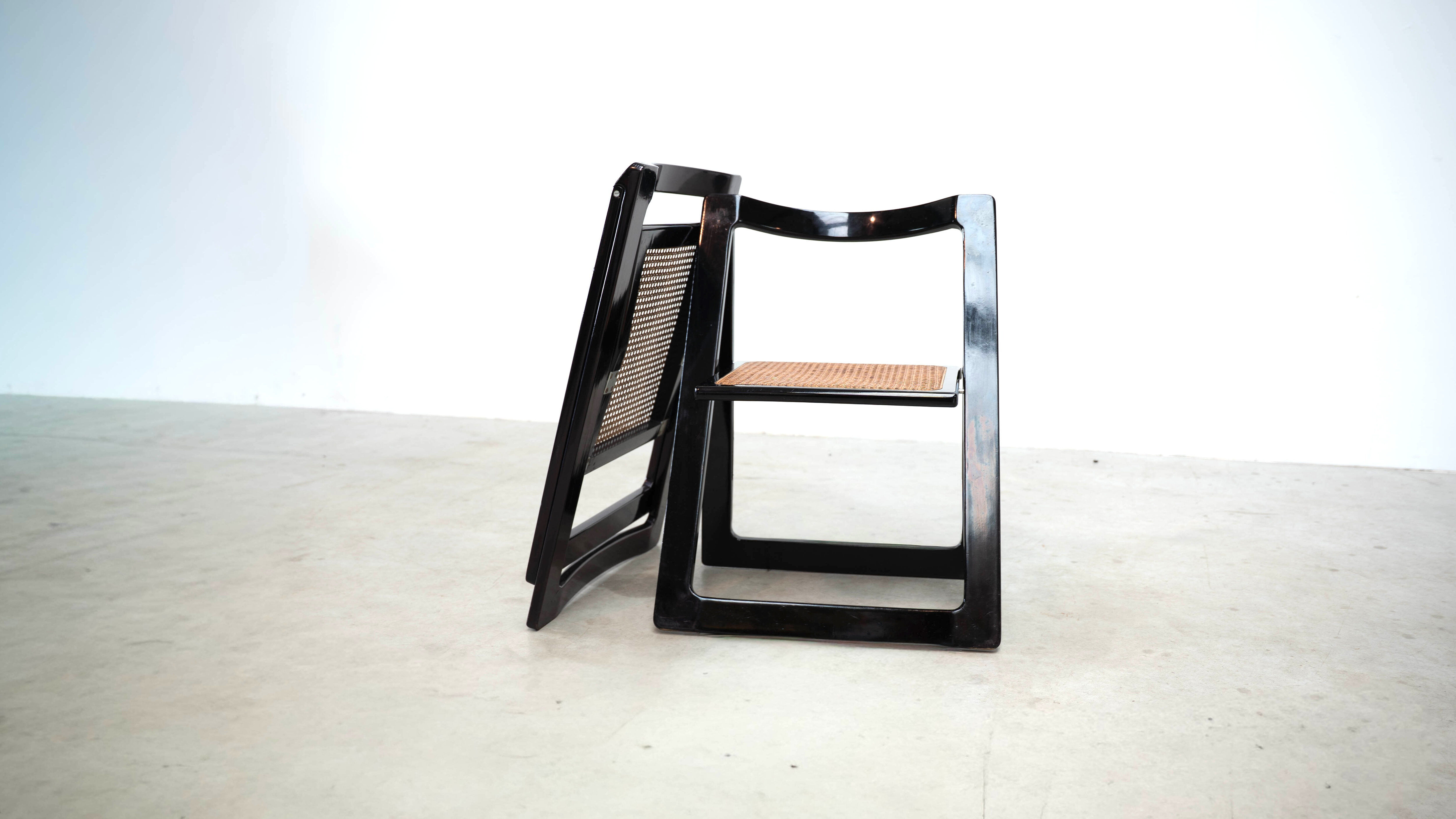 Set of eight folding dining chairs designed by Aldo Jacober for Alberto Bazzani
