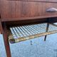 Modernist Danish teak bedside tables with rattan shelves, set of 2
