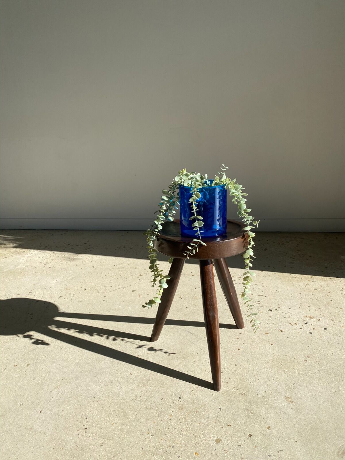 Brown solid wood stool seated circular dug