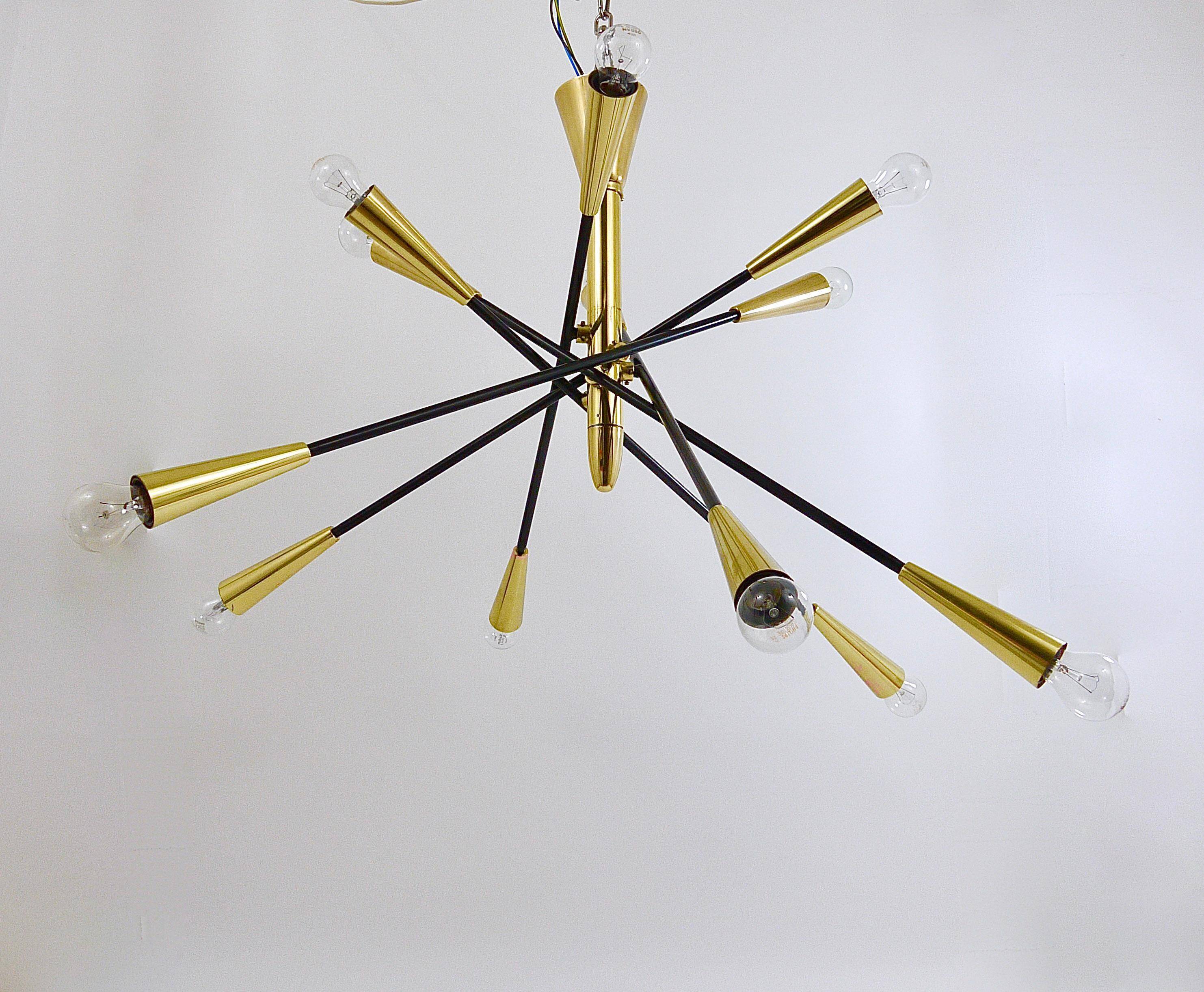 Black and brass articulated Sputnik chandelier in Stilnovo style, Italy, 1950.