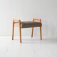 Vintage Scandinavian oak footstool with grey upholstery