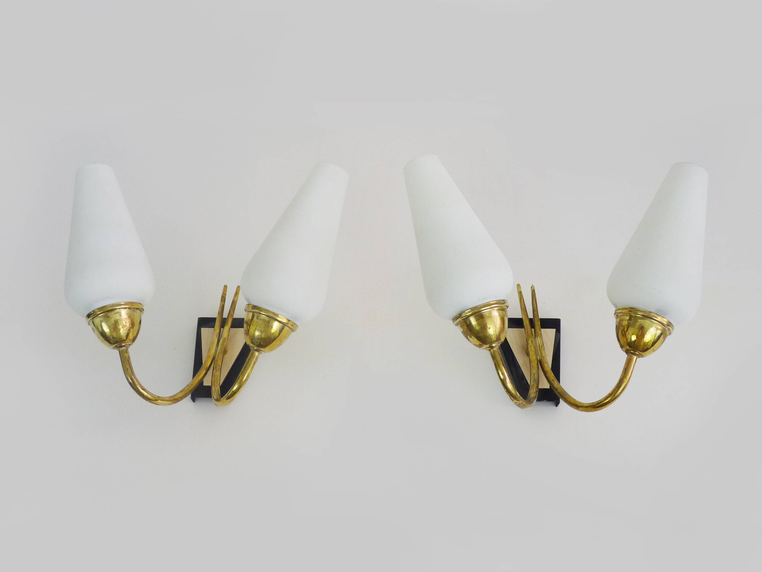 Pair of brass wall lights with double white tube lights. 70s
