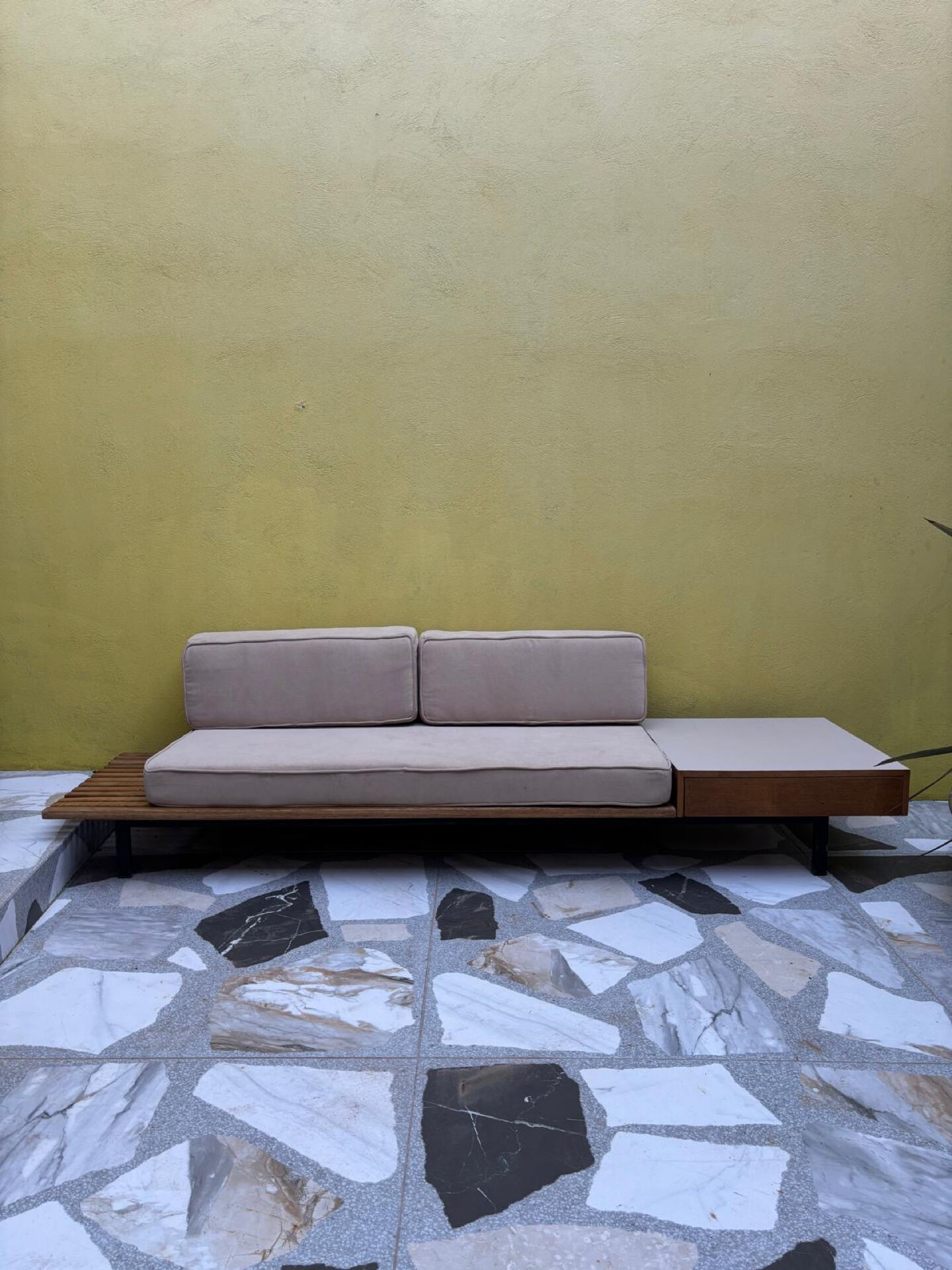 Banquette with storage by Charlotte Perriand