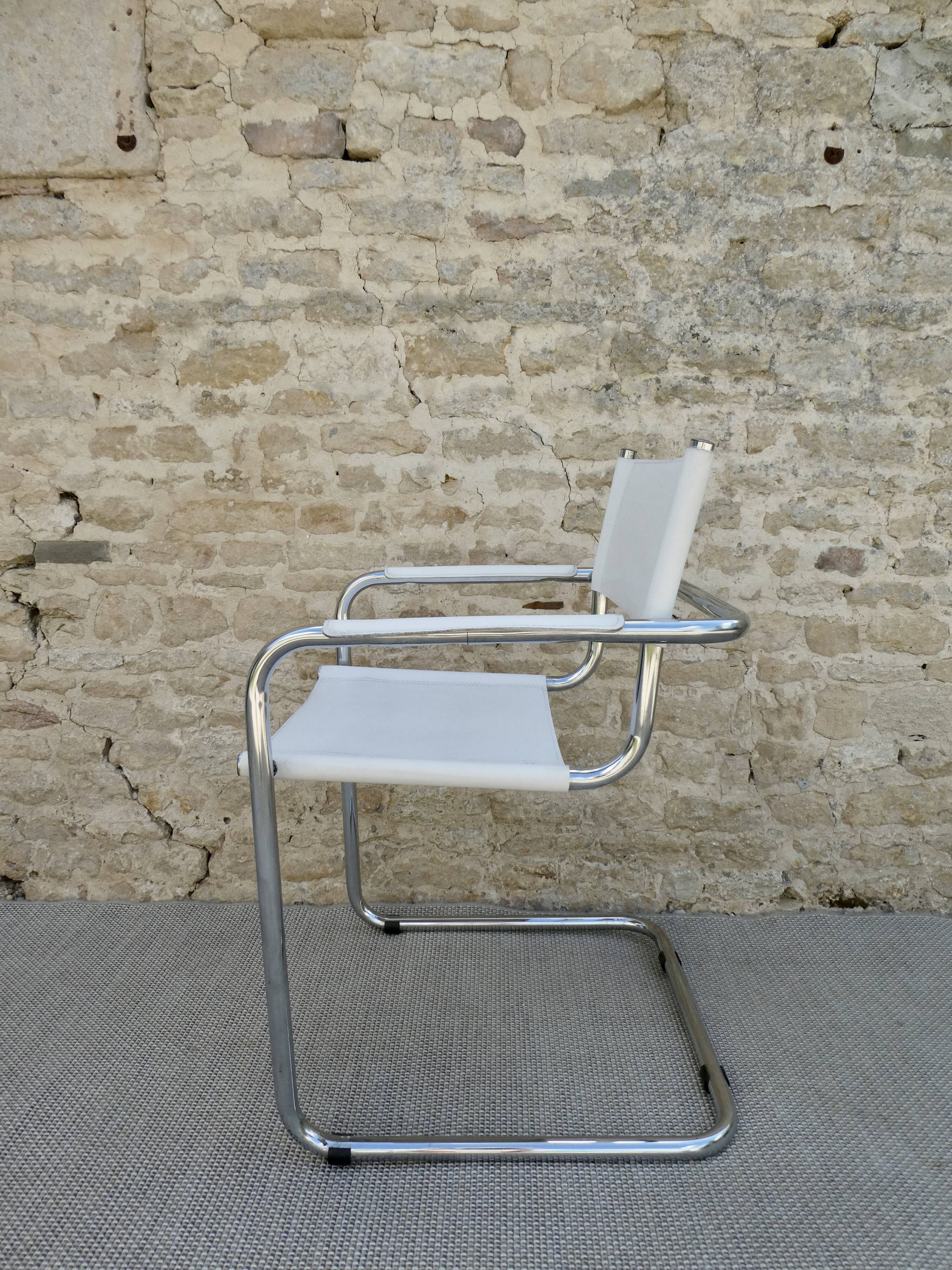 Armchair in chrome and leather