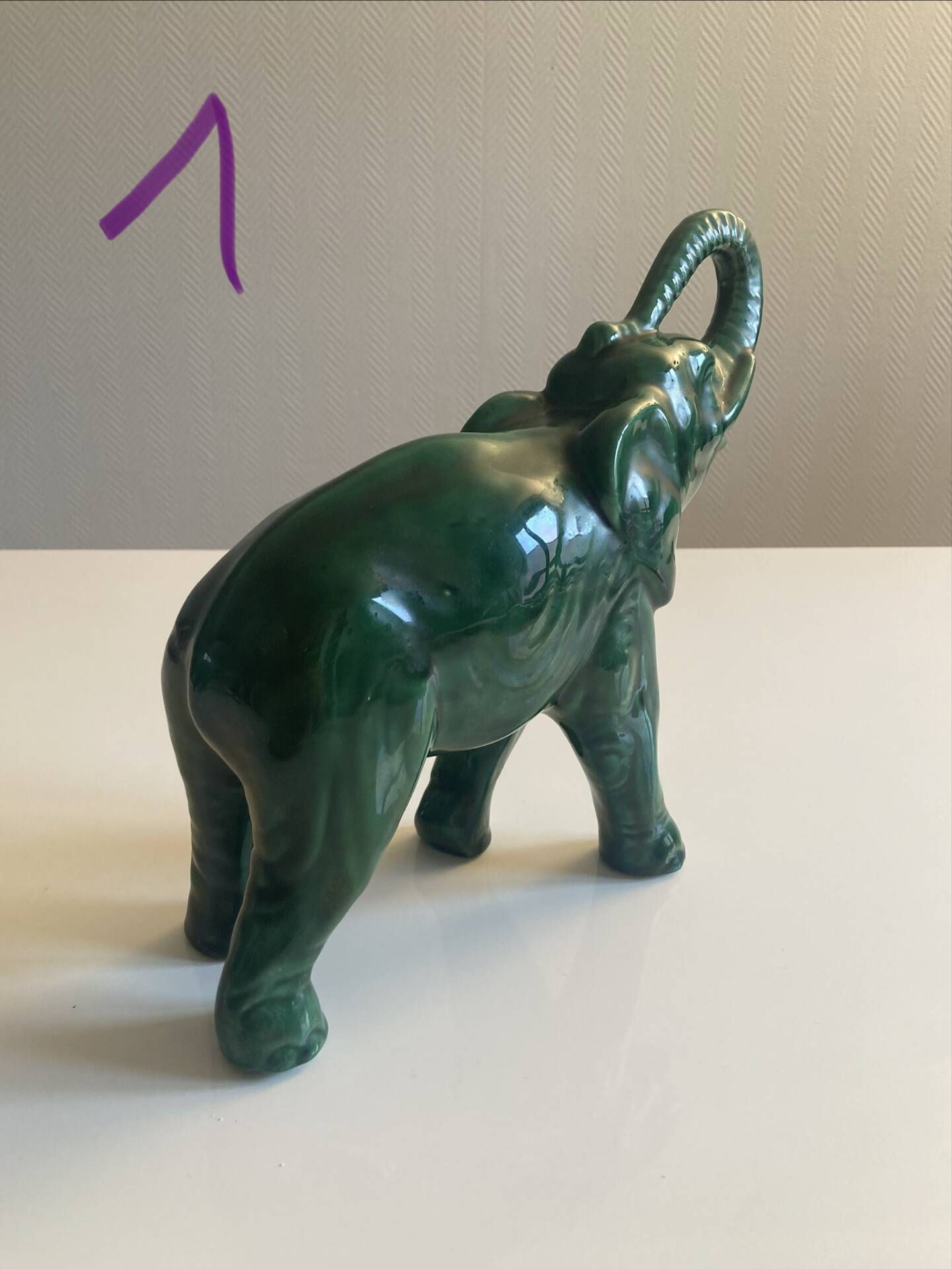 Pair of marbled faience elephants from Saint Clément