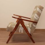 Pair of vintage lounge chairs in brown jacquard fabric and wood.