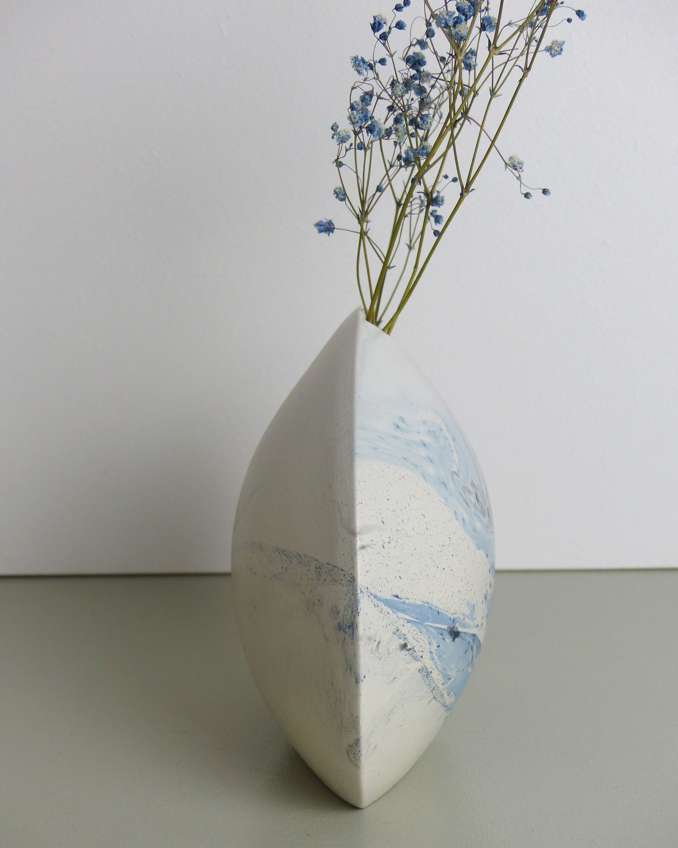 White and blue oval vase