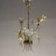 Asymmetrical Venetian chandelier in colourless and gold Murano glass, circa 1980.